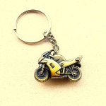 Motor kulcstartó fém réz színben